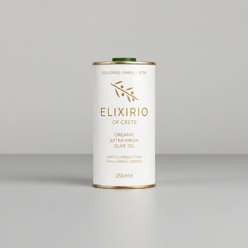 A 250ml metal can of Elixirio of Crete Organic Extra Virgin Olive Oil, featuring a white label with gold lettering and a green cap, centered on a plain white background.