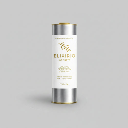 A silver cylindrical tin of Elixirio of Crete Organic Extra Virgin Olive Oil with a white label and gold accents, set against a solid gray background.