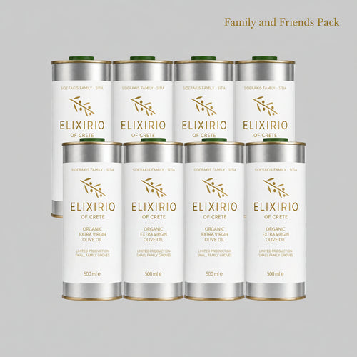 Eight white metal canisters of Elixirio of Crete organic extra virgin olive oil arranged in two rows of four on a solid gray background.